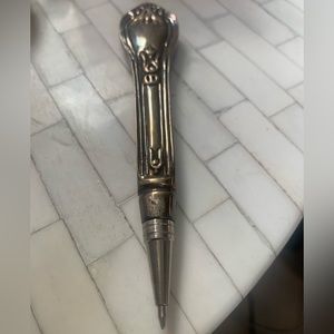 Silver ware pen with blue ink comes with a Velcro fabric pouch